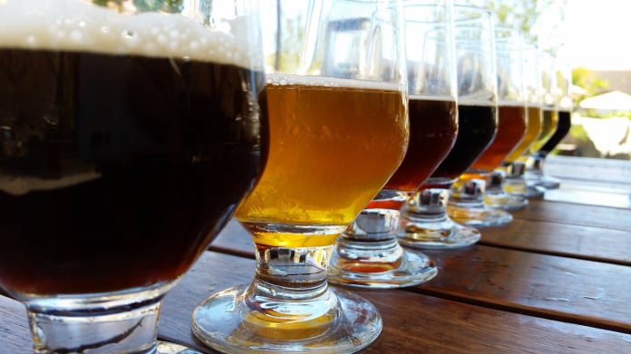 assorted beer in glasses