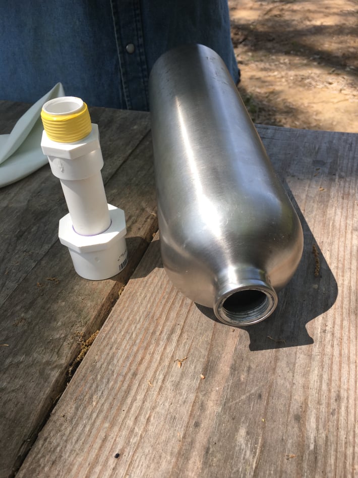stainless steel vodka bottle & PVC pipe