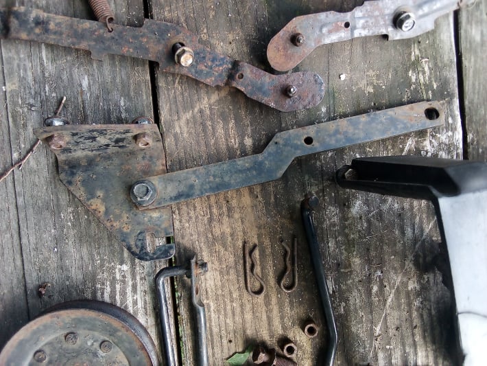 disassembling mower deck