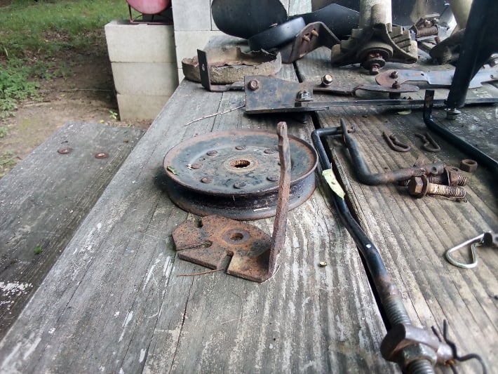 disassembling mower deck